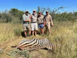 Group with Eric's Plains Zebra